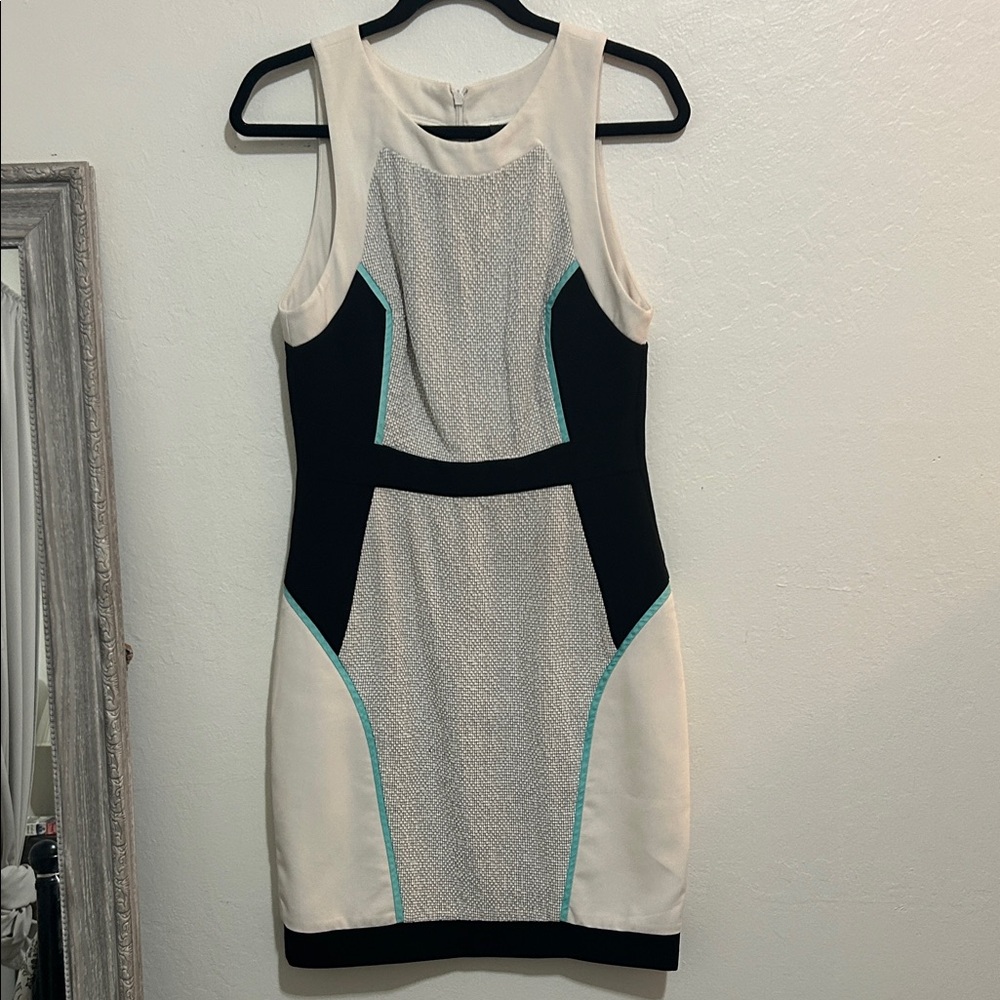 Chic Black and Cream Sleeveless Dress with Teal Accents